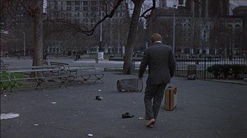 Movie still from “Barefoot in the Park” (1967), directed by Gene Saks – A man in a business suit walking across a park; Wide shot, High angle