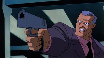 Movie still from “Batman: Mask of the Phantasm” (1993), directed by Kevin Altieri – A man holding a gun pointed to the ground; Close Up shot, Low angle