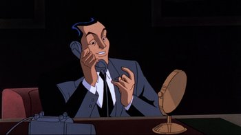 Movie still from “Batman: Mask of the Phantasm” (1993), directed by Kevin Altieri – A man in a suit talking on the phone; Close Up shot, High angle