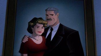 Movie still from “Batman: Mask of the Phantasm” (1993), directed by Kevin Altieri – An older man standing next to an older woman; Close Up shot, Low angle