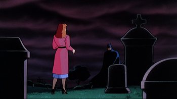 Movie still from “Batman: Mask of the Phantasm” (1993), directed by Kevin Altieri – A woman standing in front of a grave with a bat in the background; Wide shot, Over the shoulder angle