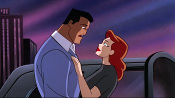 Movie still from “Batman: Mask of the Phantasm” (1993), directed by Kevin Altieri – A man and a woman standing next to each other; Medium shot, Low angle