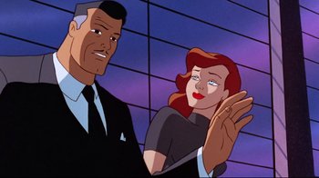 Movie still from “Batman: Mask of the Phantasm” (1993), directed by Kevin Altieri – A man standing next to a woman in front of a building; Medium shot, Over the shoulder angle