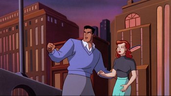 Movie still from “Batman: Mask of the Phantasm” (1993), directed by Kevin Altieri – A man and a woman standing next to each other in front of buildings; Medium shot, Over the shoulder angle