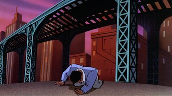 Movie still from “Batman: Mask of the Phantasm” (1993), directed by Kevin Altieri – A man is laying on the ground in front of a bridge; Wide shot, High angle