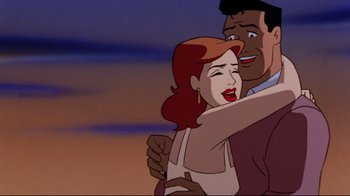 Movie still from “Batman: Mask of the Phantasm” (1993), directed by Kevin Altieri – A man and a woman are hugging and smiling for the camera; Medium shot, Low angle