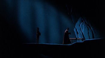 Movie still from “Batman: Mask of the Phantasm” (1993), directed by Kevin Altieri – A scene of batman and robin in a dark setting; Extreme Wide shot, Low angle