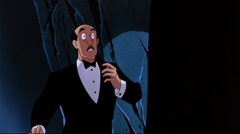 Movie still from “Batman: Mask of the Phantasm” (1993), directed by Kevin Altieri – A man in a tuxedo is looking up at the moon; Close Up shot, Low angle