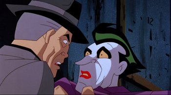 Movie still from “Batman: Mask of the Phantasm” (1993), directed by Kevin Altieri – Two people are looking at each other in a cartoon; Close Up shot, Over the shoulder angle