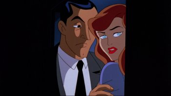 Movie still from “Batman: Mask of the Phantasm” (1993), directed by Kevin Altieri – A man and a woman are looking at the camera; Close Up shot, Over the shoulder angle