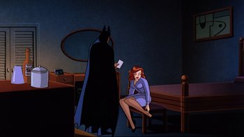 Movie still from “Batman: Mask of the Phantasm” (1993), directed by Kevin Altieri – A woman sitting in front of a batman in a dark room; Wide shot, Over the shoulder angle