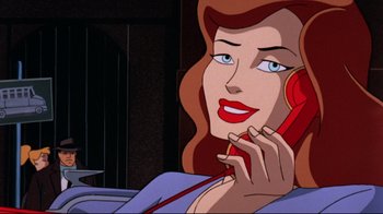 Movie still from “Batman: Mask of the Phantasm” (1993), directed by Kevin Altieri – A woman talking on a phone while sitting in a chair; Close Up shot, High angle