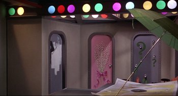 Movie still from “Batman: The Movie” (1966), directed by Leslie H. Martinson – A room that has a bunch of lights in it; Medium shot, Low angle
