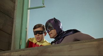 Movie still from “Batman: The Movie” (1966), directed by Leslie H. Martinson – Two boys dressed up like batman and robin; Medium shot, Low angle