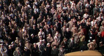 Movie still from “Batman: The Movie” (1966), directed by Leslie H. Martinson – A large group of people wearing hats and suits; Extreme Wide shot, High angle