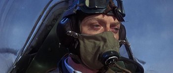 Movie still from “The Battle of Britain” (1969), directed by Guy Hamilton – A person wearing a helmet and mask; Close Up shot, Overhead angle