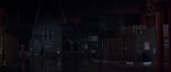 Movie still from “The Battle of Britain” (1969), directed by Guy Hamilton – A dark night with a lot of lights in the background; Extreme Wide shot, High angle