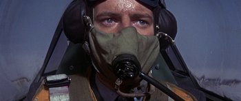 Movie still from “The Battle of Britain” (1969), directed by Guy Hamilton – A person wearing a mask; Close Up shot, Low angle