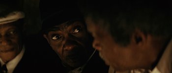 Movie still from “Be Kind Rewind” (2008), directed by Michel Gondry – A man looking at another man in the dark; Close Up shot, Over the shoulder angle
