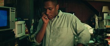 Movie still from “Be Kind Rewind” (2008), directed by Michel Gondry – A man is talking on a cell phone; Close Up shot, Low angle