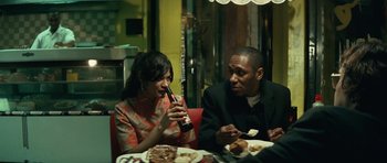 Movie still from “Be Kind Rewind” (2008), directed by Michel Gondry – A man and a woman sitting at a dinner table; Medium shot, Over the shoulder angle