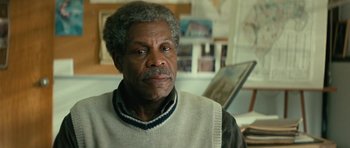 Movie still from “Be Kind Rewind” (2008), directed by Michel Gondry – An older man wearing a white vest looking at the camera; Close Up shot, Over the shoulder angle