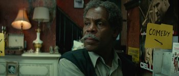 Movie still from “Be Kind Rewind” (2008), directed by Michel Gondry – An older black man with a beard and mustache; Close Up shot, Low angle