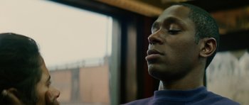 Movie still from “Be Kind Rewind” (2008), directed by Michel Gondry – A person with his eyes closed; Close Up shot, Low angle