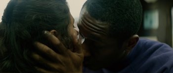 Movie still from “Be Kind Rewind” (2008), directed by Michel Gondry – A man and a woman are kissing in a room; Extreme Close Up shot, Low angle