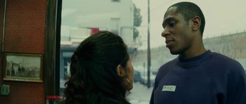 Movie still from “Be Kind Rewind” (2008), directed by Michel Gondry – A man and a woman are standing together; Close Up shot, Over the shoulder angle