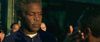 Movie still from “Be Kind Rewind” (2008), directed by Michel Gondry – An older man is looking down at his face; Close Up shot, Over the shoulder angle