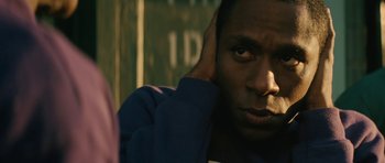 Movie still from “Be Kind Rewind” (2008), directed by Michel Gondry – A person holding his head with his hands; Close Up shot, Over the shoulder angle