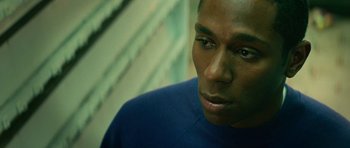 Movie still from “Be Kind Rewind” (2008), directed by Michel Gondry – A person wearing a blue shirt; Close Up shot, Low angle