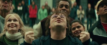 Movie still from “Be Kind Rewind” (2008), directed by Michel Gondry – A man with glasses is being hugged by another man; Close Up shot, Low angle