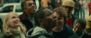 Movie still from “Be Kind Rewind” (2008), directed by Michel Gondry – A group of people standing next to each other in a crowd; Close Up shot, Low angle