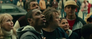 Movie still from “Be Kind Rewind” (2008), directed by Michel Gondry – A group of people sitting in front of each other; Close Up shot, Low angle