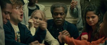 Movie still from “Be Kind Rewind” (2008), directed by Michel Gondry – A man and a woman sitting next to each other in a room; Close Up shot, High angle