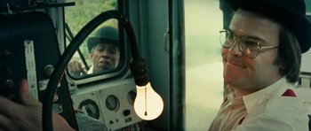 Movie still from “Be Kind Rewind” (2008), directed by Michel Gondry – An old man looking out a window in a bus; Close Up shot, Over the shoulder angle