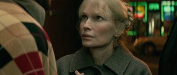 Movie still from “Be Kind Rewind” (2008), directed by Michel Gondry – An older woman looking into a mirror in a room; Close Up shot, Over the shoulder angle