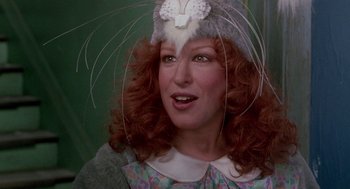 Movie still from “Beaches” (1988), directed by Garry Marshall – A person wearing a hat; Close Up shot, Over the shoulder angle