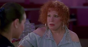 Movie still from “Beaches” (1988), directed by Garry Marshall – A person with curly red hair; Close Up shot, Over the shoulder angle