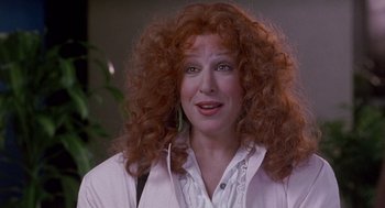 Movie still from “Beaches” (1988), directed by Garry Marshall – A person with curly red hair; Close Up shot, Over the shoulder angle