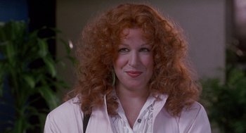 Movie still from “Beaches” (1988), directed by Garry Marshall – A person with curly red hair; Close Up shot, Over the shoulder angle