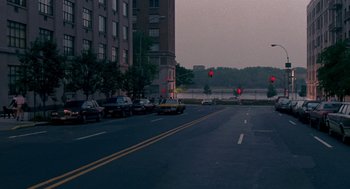 Movie still from “Beaches” (1988), directed by Garry Marshall – Cars are parked on the side of the road; Extreme Wide shot, High angle
