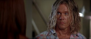 Movie still from “Beauty Shop” (2005), directed by Bille Woodruff – A person with long blonde hair; Close Up shot, Low angle