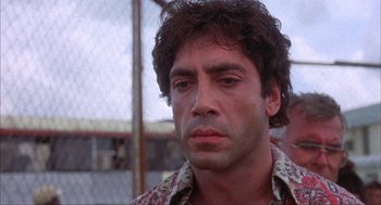 Movie still from “Before Night Falls” (2000), directed by Julian Schnabel – A person wearing a shirt; Close Up shot, Low angle