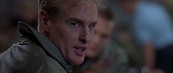 Movie still from “Behind Enemy Lines” (2001), directed by John Moore – A person looking at the camera; Close Up shot, Low angle