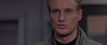 Movie still from “Behind Enemy Lines” (2001), directed by John Moore – A person wearing a jacket; Close Up shot, Low angle