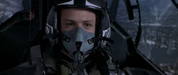 Movie still from “Behind Enemy Lines” (2001), directed by John Moore – A man in a fighter pilot's helmet and mask; Close Up shot, Low angle
