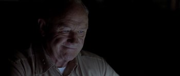 Movie still from “Behind Enemy Lines” (2001), directed by John Moore – An older man is looking at the camera; Close Up shot, Low angle